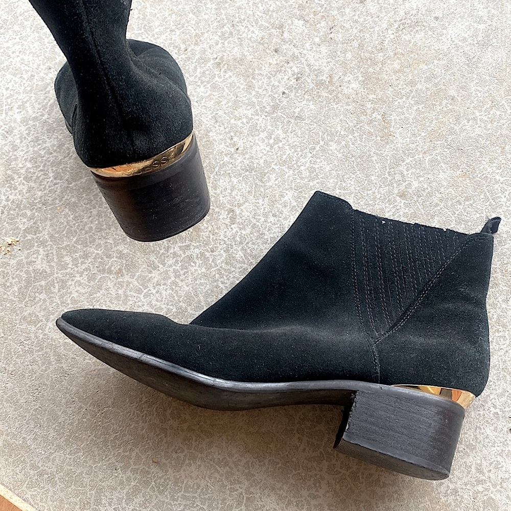 Black booties with gold heal
